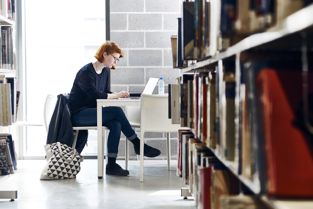 Student in a university library