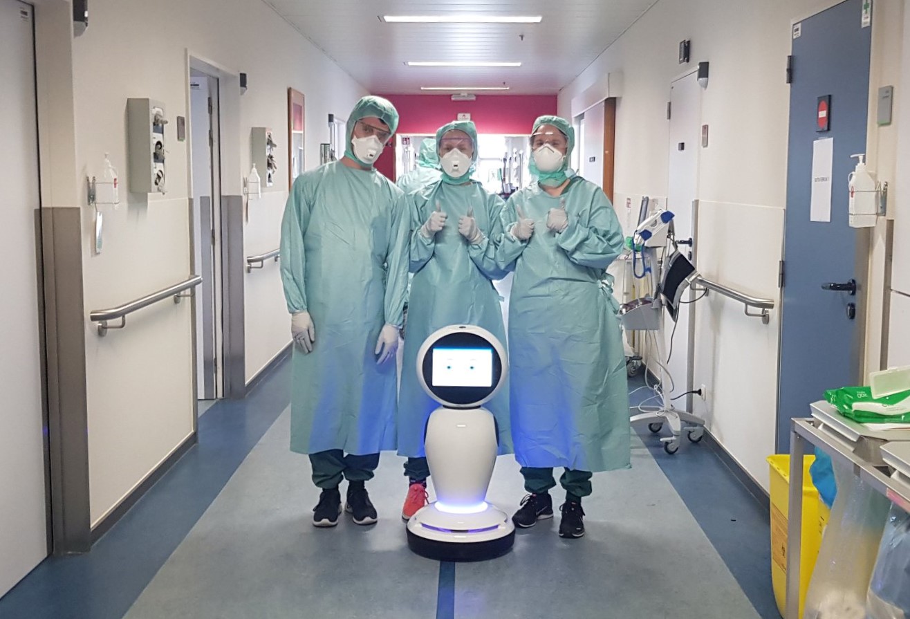 The nursing staff of the ZNA hospital with the robot that the hospital received for the COVID-19 department